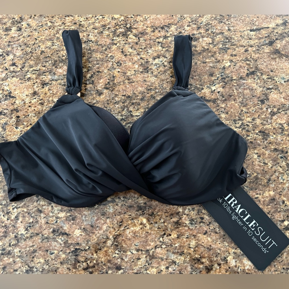 Miraclesuit black bikini top.  Sz. 38 D. Very comfortable.  NWT. Make offer!